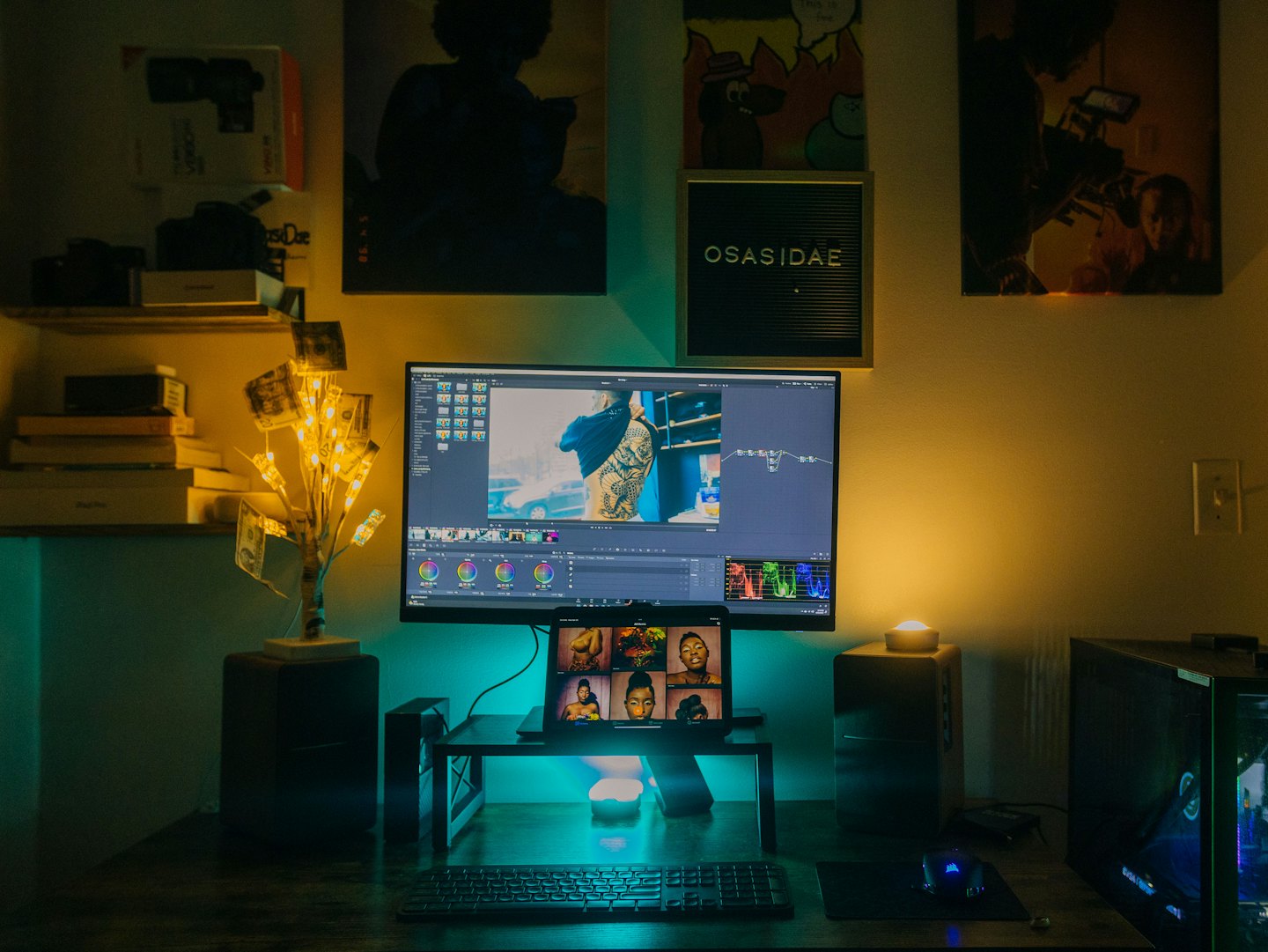 Computer workstation for video editing with multiple screens.